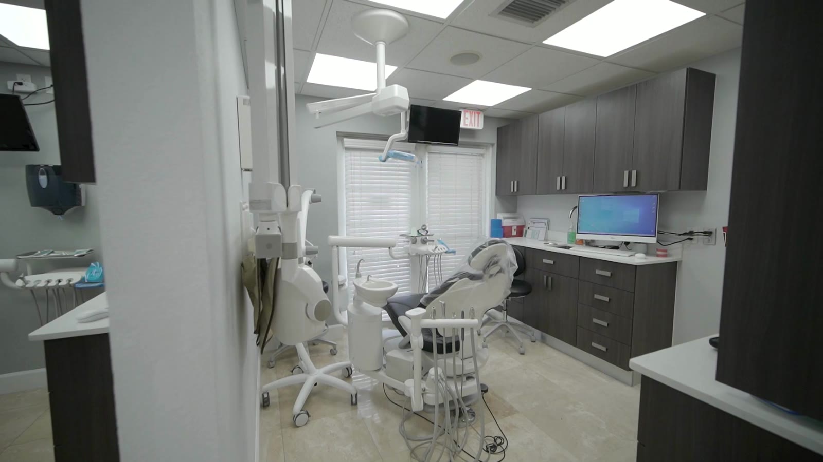 Dental chair in a treatment room at our Miami office